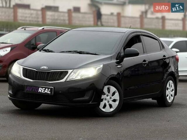 Черный Киа Рио, объемом двигателя 1.4 л и пробегом 220 тыс. км за 8200 $, фото 1 на Automoto.ua