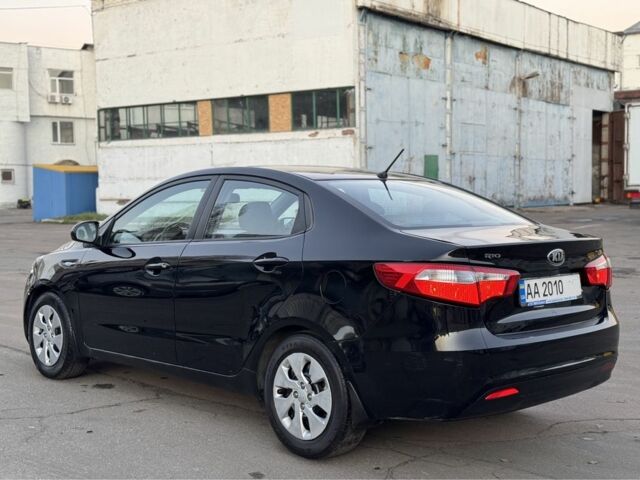 Черный Киа Рио, объемом двигателя 1.4 л и пробегом 305 тыс. км за 4750 $, фото 5 на Automoto.ua
