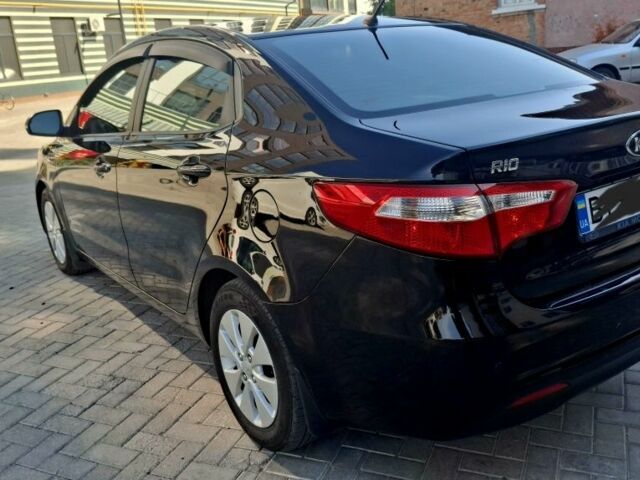 Черный Киа Рио, объемом двигателя 1.6 л и пробегом 130 тыс. км за 8750 $, фото 5 на Automoto.ua