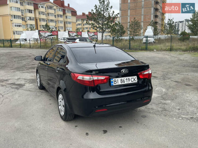 Черный Киа Рио, объемом двигателя 1.4 л и пробегом 136 тыс. км за 7700 $, фото 8 на Automoto.ua