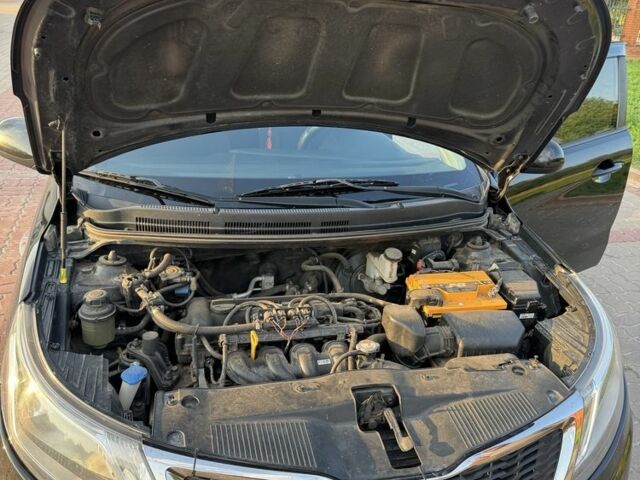 Черный Киа Рио, объемом двигателя 1.4 л и пробегом 185 тыс. км за 5777 $, фото 5 на Automoto.ua
