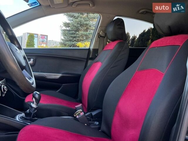 Чорний Кіа Ріо, об'ємом двигуна 1.4 л та пробігом 215 тис. км за 6999 $, фото 8 на Automoto.ua