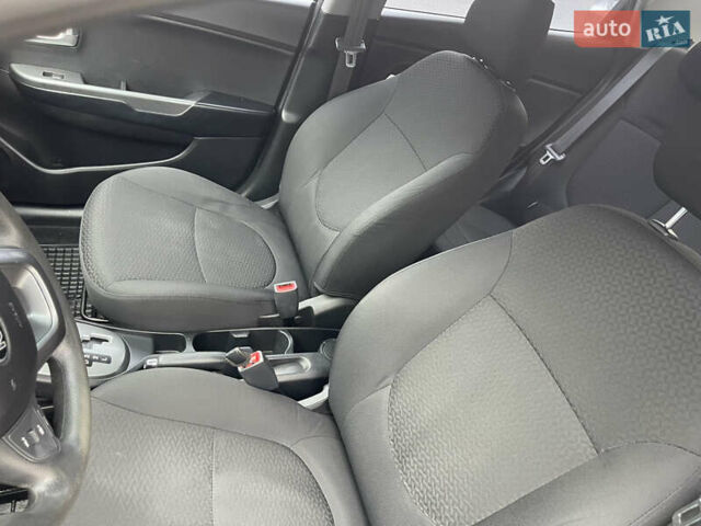Чорний Кіа Ріо, об'ємом двигуна 1.4 л та пробігом 136 тис. км за 7950 $, фото 23 на Automoto.ua