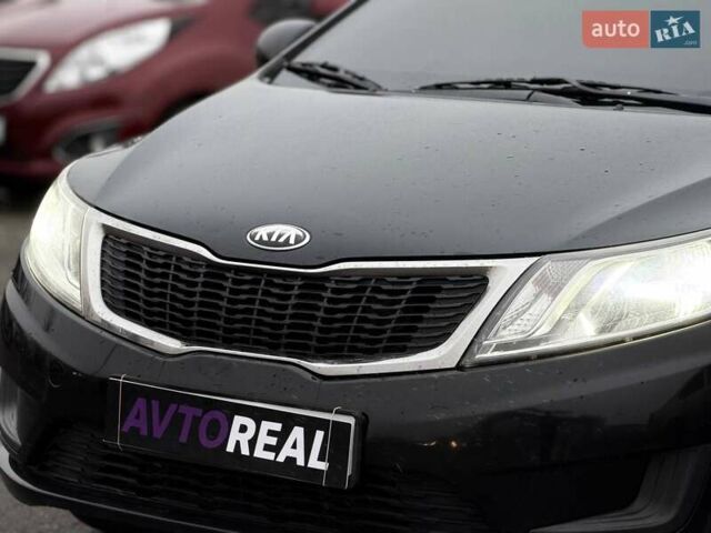 Черный Киа Рио, объемом двигателя 1.4 л и пробегом 220 тыс. км за 8200 $, фото 7 на Automoto.ua
