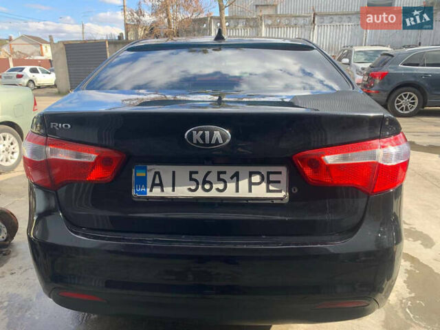 Чорний Кіа Ріо, об'ємом двигуна 1.4 л та пробігом 100 тис. км за 4800 $, фото 4 на Automoto.ua