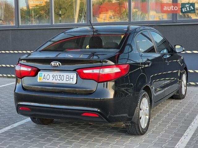 Черный Киа Рио, объемом двигателя 1.6 л и пробегом 192 тыс. км за 6999 $, фото 9 на Automoto.ua