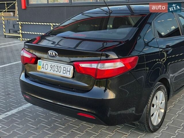 Черный Киа Рио, объемом двигателя 1.6 л и пробегом 192 тыс. км за 6999 $, фото 7 на Automoto.ua