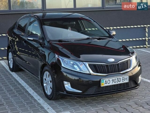 Черный Киа Рио, объемом двигателя 1.6 л и пробегом 192 тыс. км за 6999 $, фото 2 на Automoto.ua