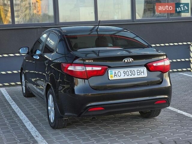 Черный Киа Рио, объемом двигателя 1.6 л и пробегом 192 тыс. км за 6999 $, фото 13 на Automoto.ua