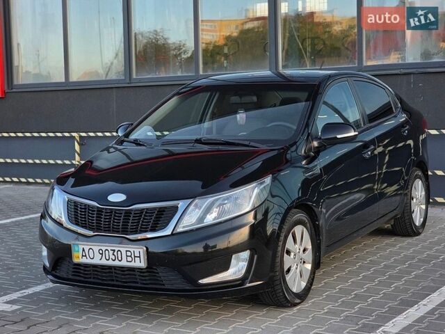Черный Киа Рио, объемом двигателя 1.6 л и пробегом 192 тыс. км за 6999 $, фото 4 на Automoto.ua