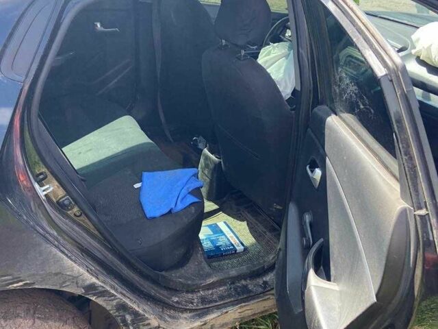 Черный Киа Рио, объемом двигателя 1.4 л и пробегом 1 тыс. км за 1778 $, фото 1 на Automoto.ua