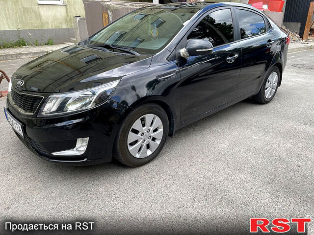 Черный Киа Рио, объемом двигателя 1.6 л и пробегом 137 тыс. км за 8799 $, фото 1 на Automoto.ua