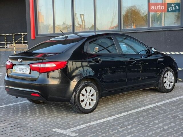 Черный Киа Рио, объемом двигателя 1.6 л и пробегом 192 тыс. км за 6999 $, фото 10 на Automoto.ua