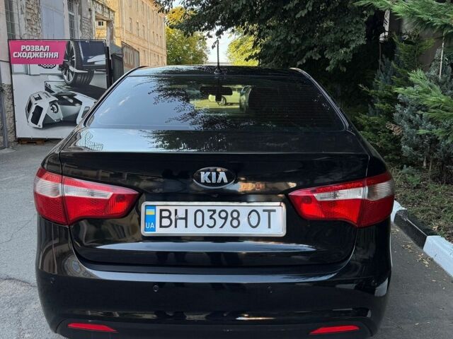 Чорний Кіа Ріо, об'ємом двигуна 1.59 л та пробігом 101 тис. км за 8300 $, фото 6 на Automoto.ua