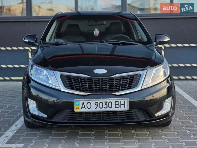 Черный Киа Рио, объемом двигателя 1.6 л и пробегом 192 тыс. км за 6999 $, фото 3 на Automoto.ua