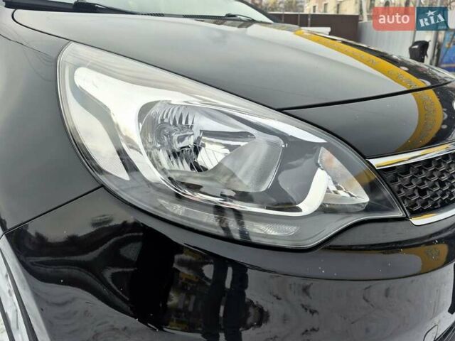 Черный Киа Рио, объемом двигателя 1.4 л и пробегом 66 тыс. км за 11950 $, фото 23 на Automoto.ua