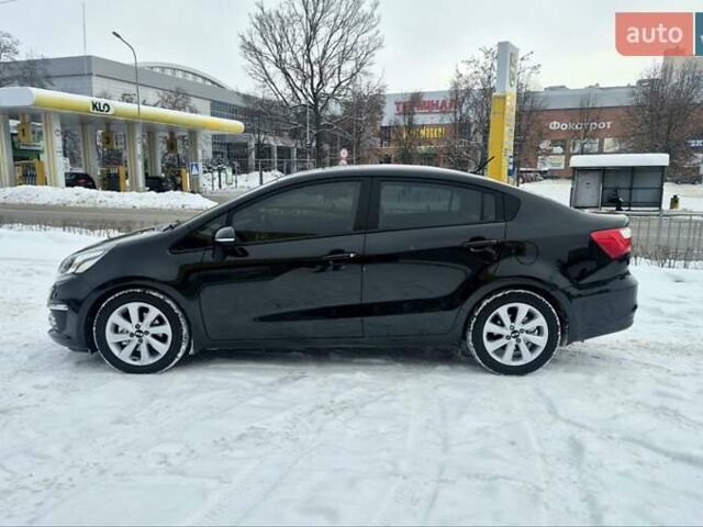 Черный Киа Рио, объемом двигателя 1.4 л и пробегом 66 тыс. км за 11950 $, фото 5 на Automoto.ua