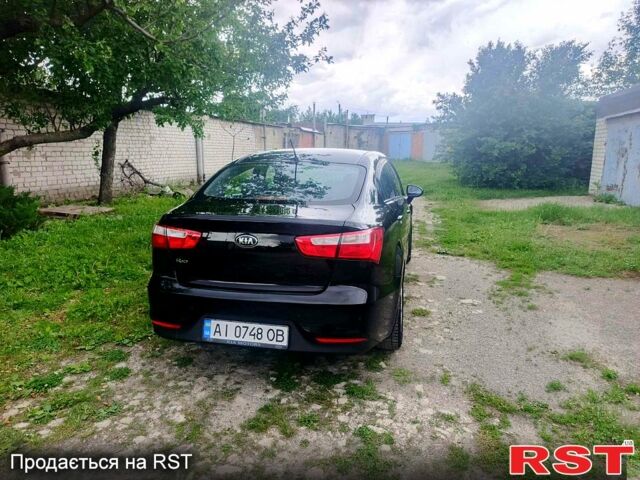 Чорний Кіа Ріо, об'ємом двигуна 1.4 л та пробігом 179 тис. км за 6100 $, фото 3 на Automoto.ua