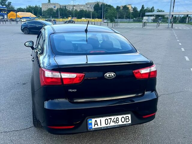 Черный Киа Рио, объемом двигателя 1.4 л и пробегом 240 тыс. км за 5900 $, фото 4 на Automoto.ua