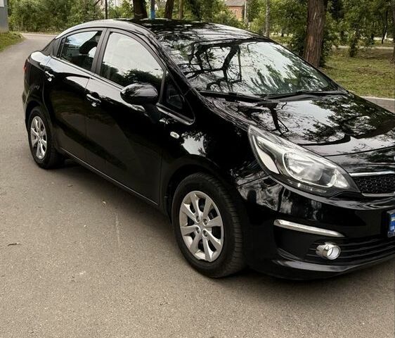 Черный Киа Рио, объемом двигателя 1.4 л и пробегом 180 тыс. км за 6900 $, фото 1 на Automoto.ua