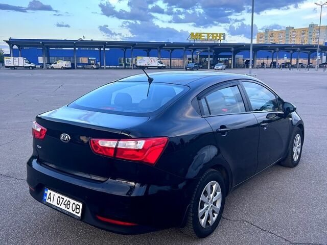 Черный Киа Рио, объемом двигателя 1.4 л и пробегом 240 тыс. км за 5900 $, фото 5 на Automoto.ua