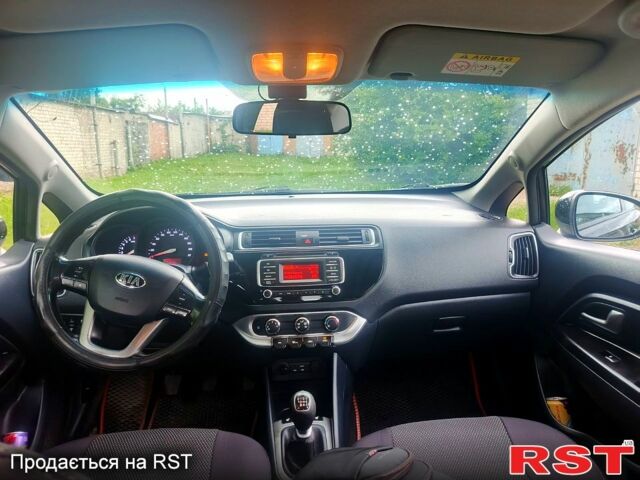Чорний Кіа Ріо, об'ємом двигуна 1.4 л та пробігом 179 тис. км за 6100 $, фото 7 на Automoto.ua