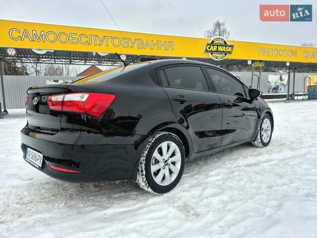 Черный Киа Рио, объемом двигателя 1.4 л и пробегом 66 тыс. км за 11950 $, фото 22 на Automoto.ua