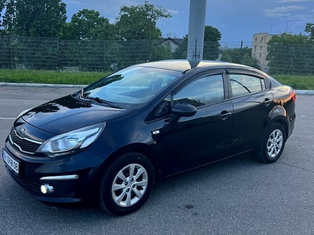 Черный Киа Рио, объемом двигателя 1.4 л и пробегом 240 тыс. км за 5900 $, фото 1 на Automoto.ua