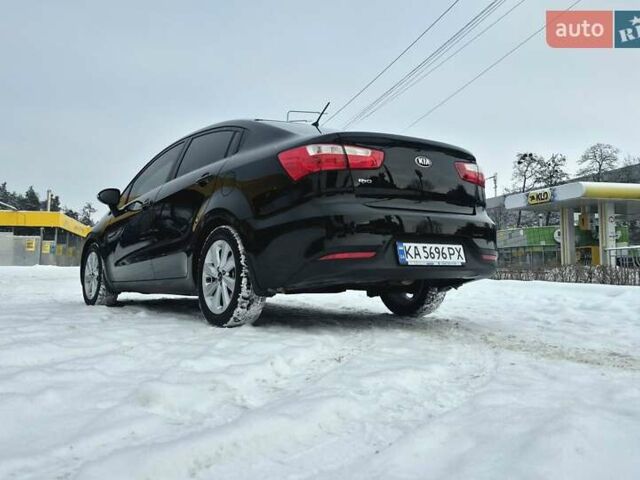 Черный Киа Рио, объемом двигателя 1.4 л и пробегом 66 тыс. км за 11950 $, фото 4 на Automoto.ua