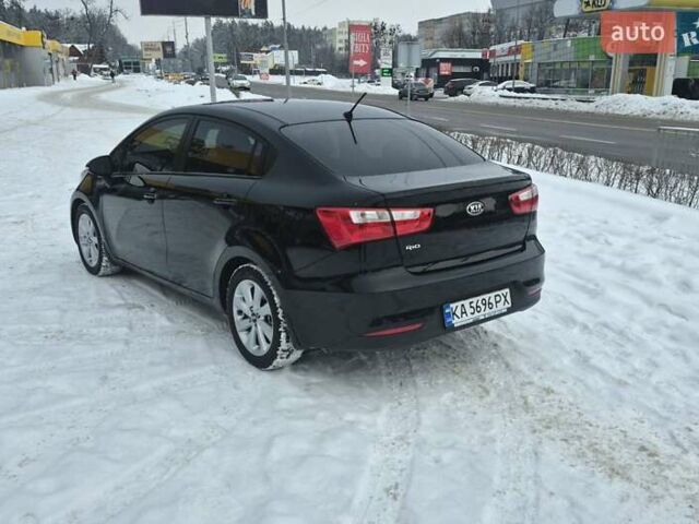 Черный Киа Рио, объемом двигателя 1.4 л и пробегом 66 тыс. км за 11950 $, фото 2 на Automoto.ua