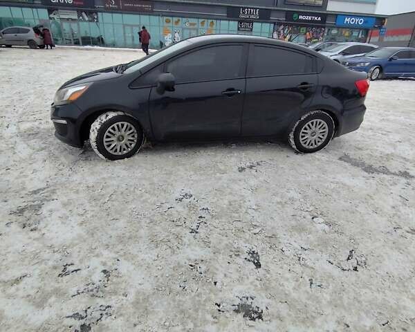 Черный Киа Рио, объемом двигателя 1.6 л и пробегом 180 тыс. км за 8799 $, фото 4 на Automoto.ua