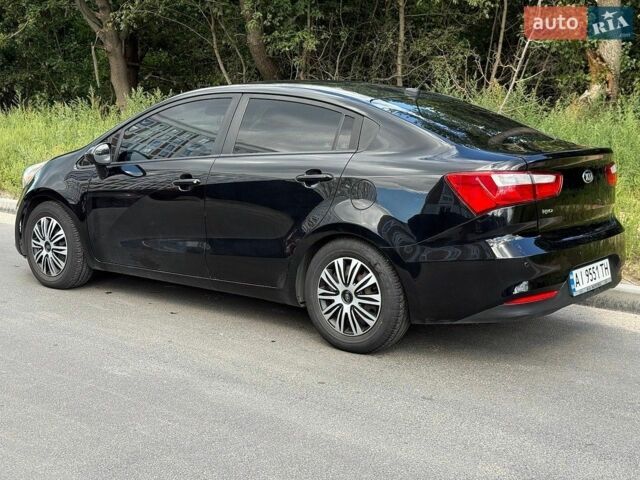 Чорний Кіа Ріо, об'ємом двигуна 1.59 л та пробігом 218 тис. км за 7500 $, фото 3 на Automoto.ua