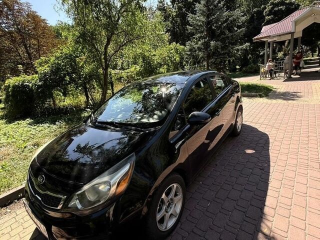 Чорний Кіа Ріо, об'ємом двигуна 1.59 л та пробігом 185 тис. км за 9200 $, фото 4 на Automoto.ua