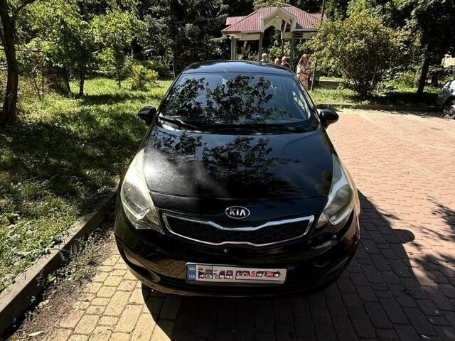 Чорний Кіа Ріо, об'ємом двигуна 1.59 л та пробігом 185 тис. км за 9200 $, фото 3 на Automoto.ua