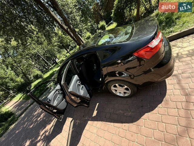 Чорний Кіа Ріо, об'ємом двигуна 1.59 л та пробігом 185 тис. км за 9200 $, фото 8 на Automoto.ua