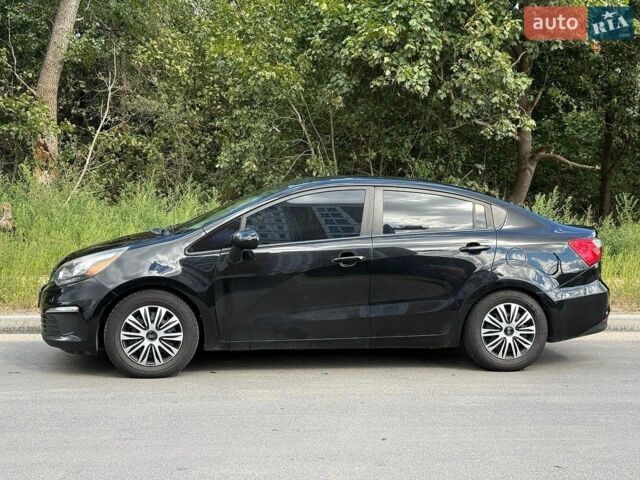 Чорний Кіа Ріо, об'ємом двигуна 1.59 л та пробігом 218 тис. км за 7500 $, фото 1 на Automoto.ua