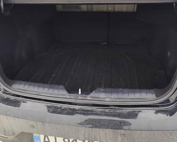 Черный Киа Рио, объемом двигателя 1.6 л и пробегом 180 тыс. км за 8799 $, фото 12 на Automoto.ua