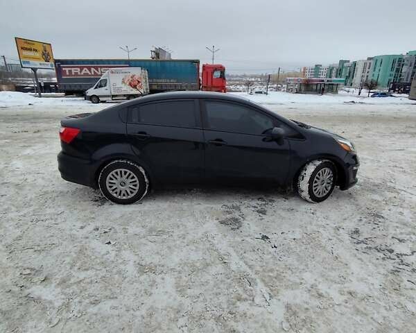 Черный Киа Рио, объемом двигателя 1.6 л и пробегом 180 тыс. км за 8799 $, фото 3 на Automoto.ua