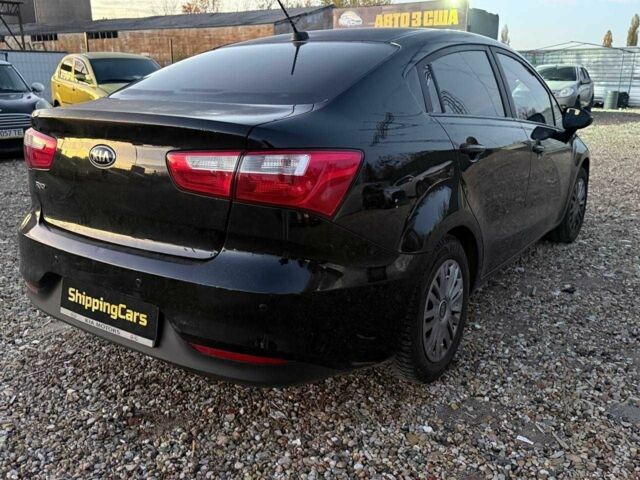 Чорний Кіа Ріо, об'ємом двигуна 1.6 л та пробігом 194 тис. км за 7800 $, фото 3 на Automoto.ua