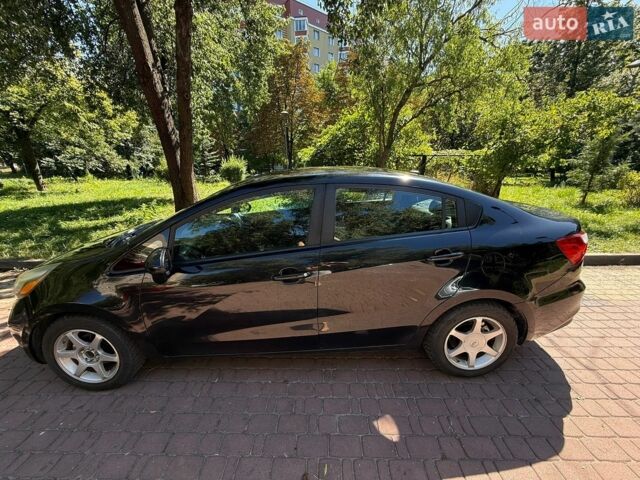 Чорний Кіа Ріо, об'ємом двигуна 1.59 л та пробігом 185 тис. км за 9200 $, фото 5 на Automoto.ua