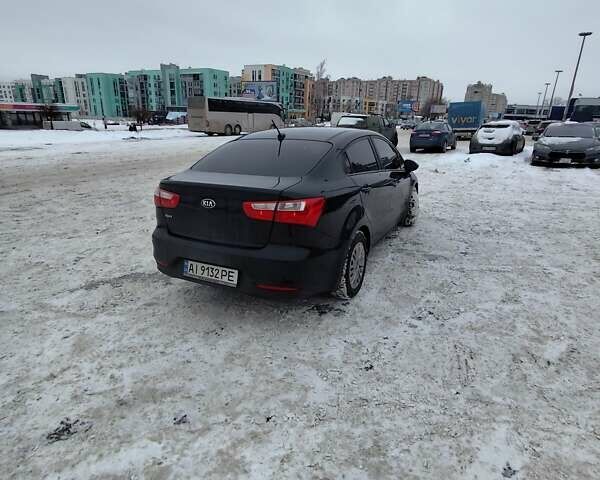 Черный Киа Рио, объемом двигателя 1.6 л и пробегом 180 тыс. км за 8799 $, фото 2 на Automoto.ua