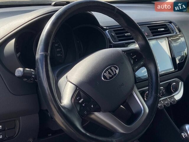Чорний Кіа Ріо, об'ємом двигуна 1.4 л та пробігом 80 тис. км за 12300 $, фото 15 на Automoto.ua