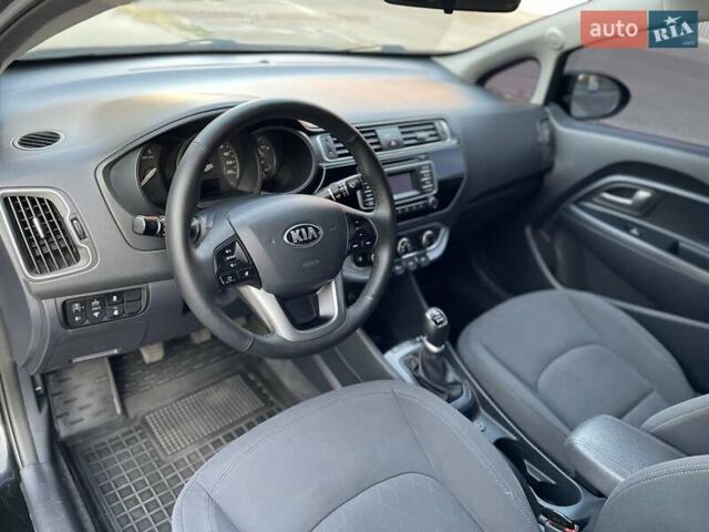 Чорний Кіа Ріо, об'ємом двигуна 1.4 л та пробігом 95 тис. км за 8999 $, фото 17 на Automoto.ua