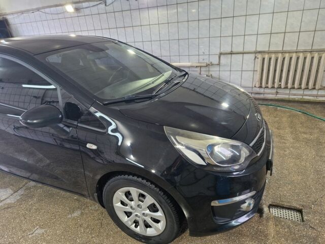 Чорний Кіа Ріо, об'ємом двигуна 1.4 л та пробігом 96 тис. км за 9500 $, фото 1 на Automoto.ua