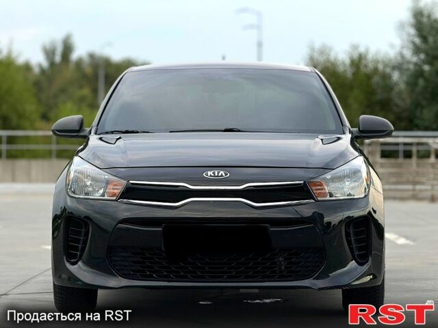 Черный Киа Рио, объемом двигателя 16 л и пробегом 128 тыс. км за 11900 $, фото 1 на Automoto.ua