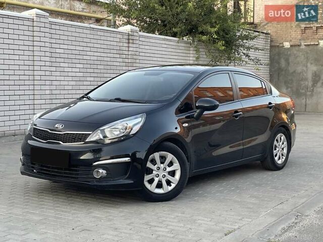 Чорний Кіа Ріо, об'ємом двигуна 1.4 л та пробігом 95 тис. км за 8999 $, фото 8 на Automoto.ua