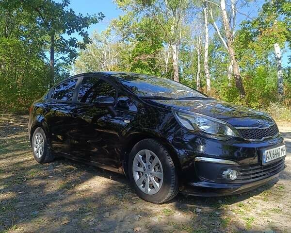 Чорний Кіа Ріо, об'ємом двигуна 1.4 л та пробігом 85 тис. км за 12500 $, фото 9 на Automoto.ua
