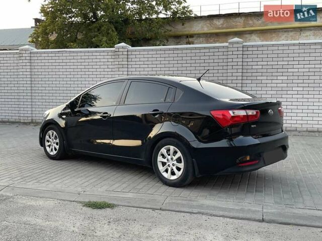 Чорний Кіа Ріо, об'ємом двигуна 1.4 л та пробігом 95 тис. км за 8999 $, фото 9 на Automoto.ua