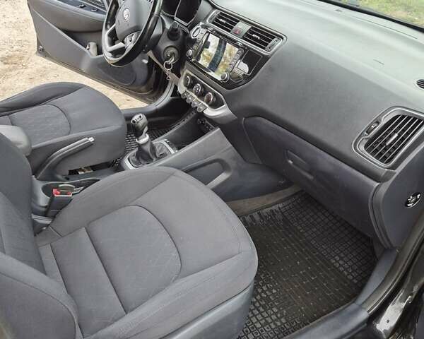 Черный Киа Рио, объемом двигателя 1.4 л и пробегом 115 тыс. км за 9400 $, фото 9 на Automoto.ua
