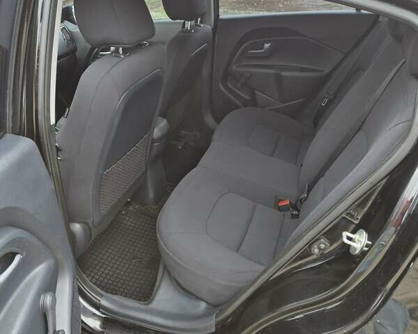 Черный Киа Рио, объемом двигателя 1.4 л и пробегом 115 тыс. км за 9500 $, фото 6 на Automoto.ua